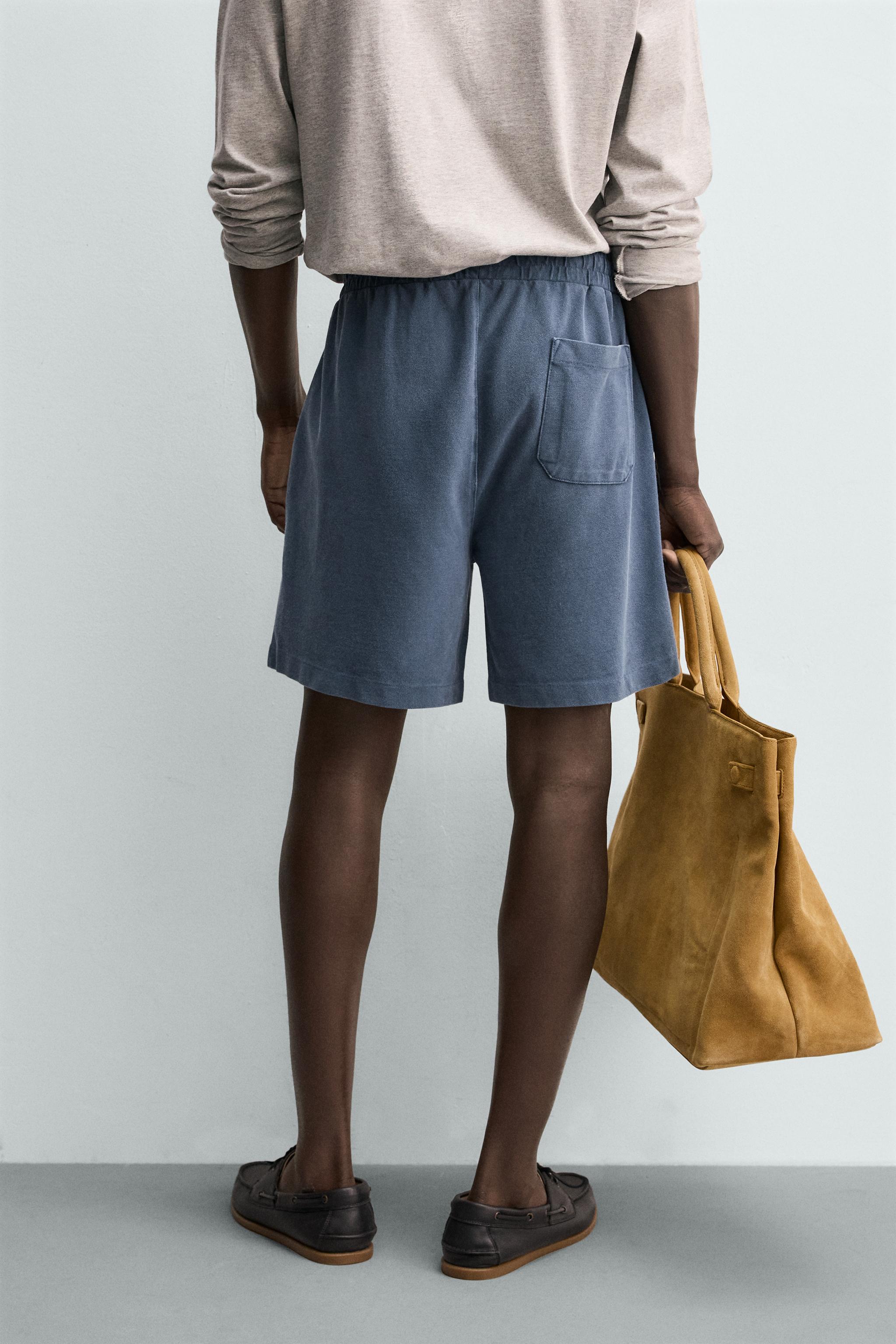 BERMUDA EN PIQUÉ REGULAR FIT DÉLAVÉ